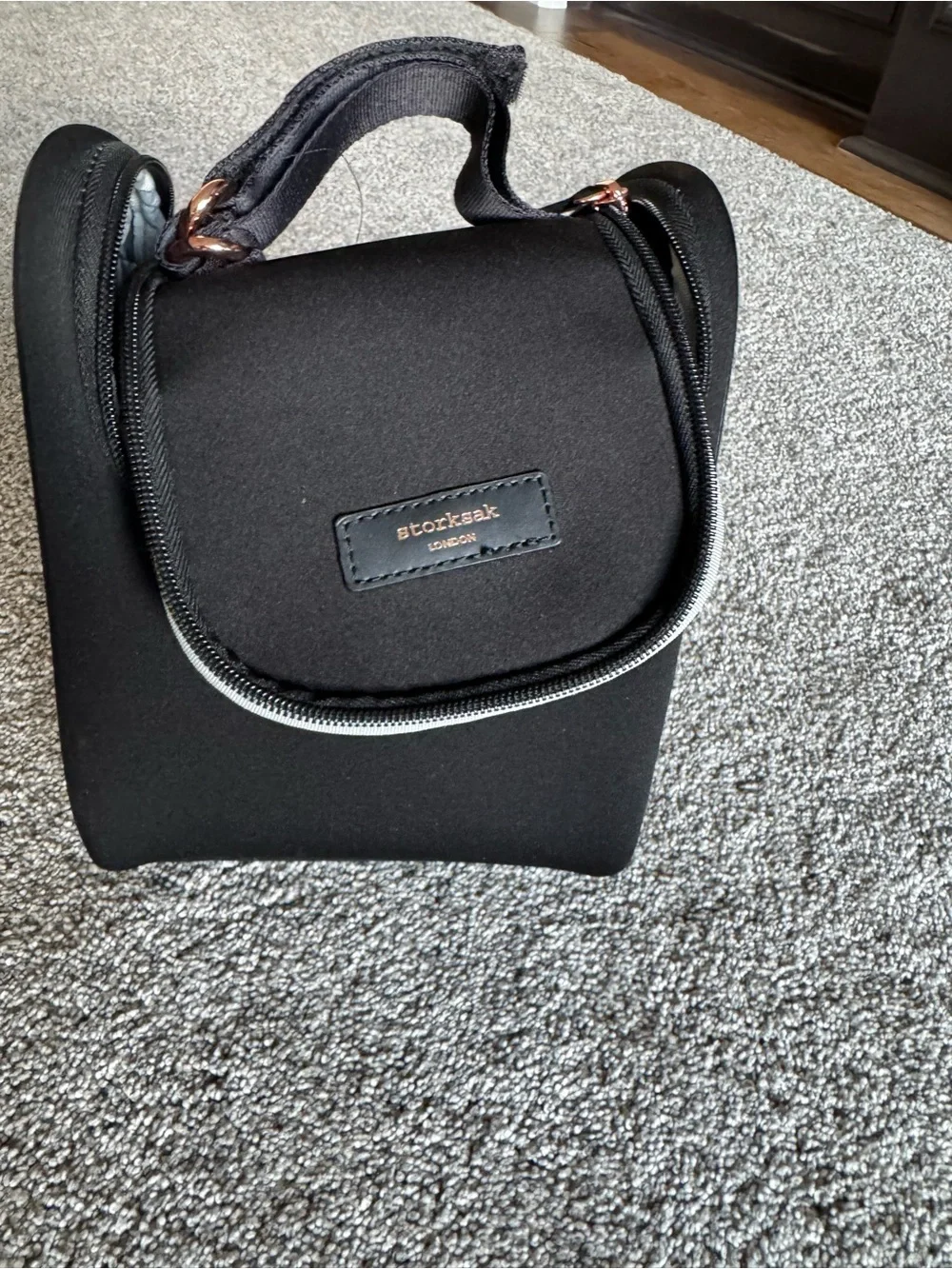 Storksak Black Quilted Baby Duffel with Rose Gold Zippers